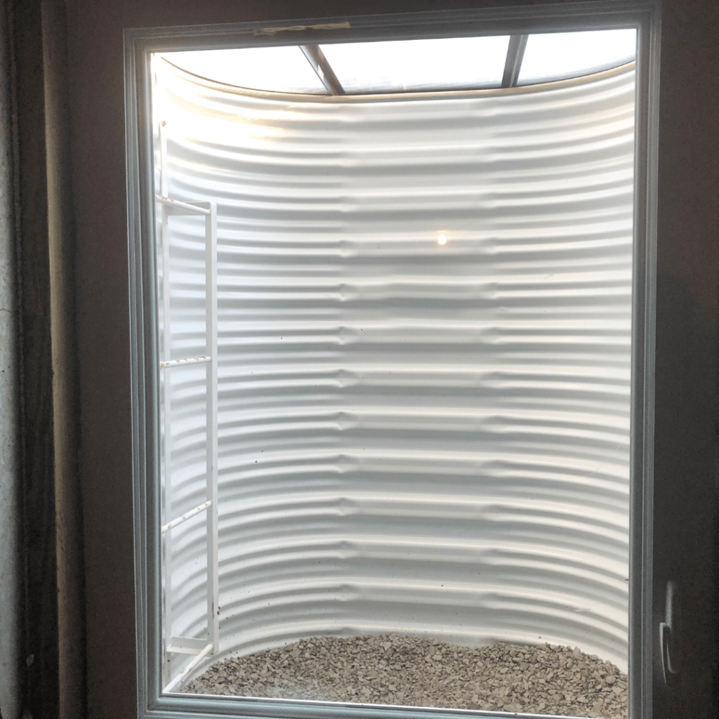 In this article you will learn about the egress window guidelines for Nebraska and Iowa, for windows like those pictured here. 
