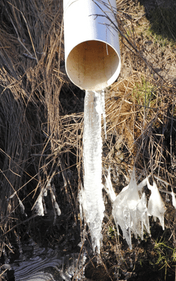 Water freezing in discharge line.